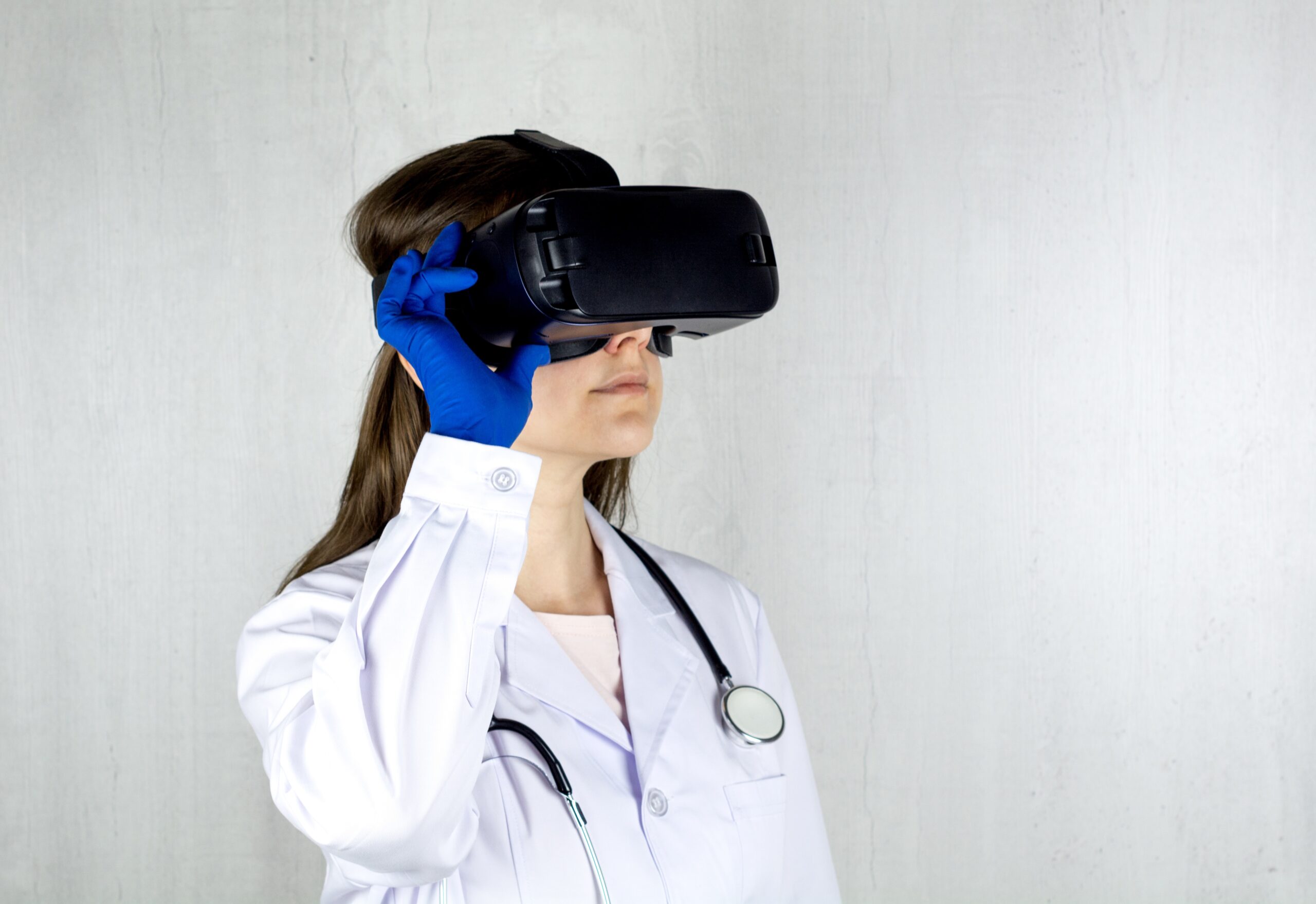 Indoors shot of doctor using virtual reality glasses.